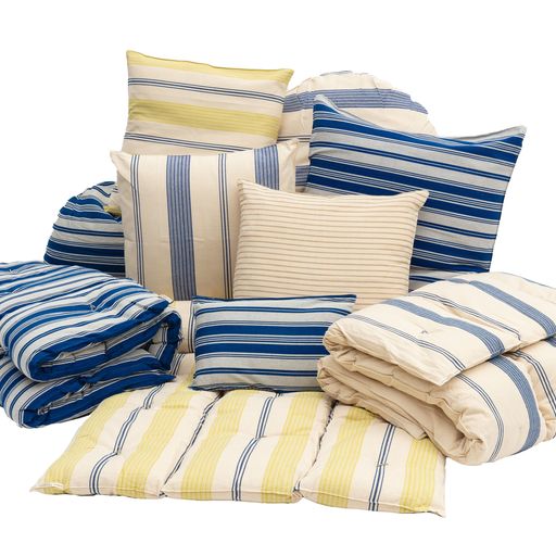 Assortment of Tensira Mattresses and Cushions on the Floor - Green, Gray, Blue, Cream