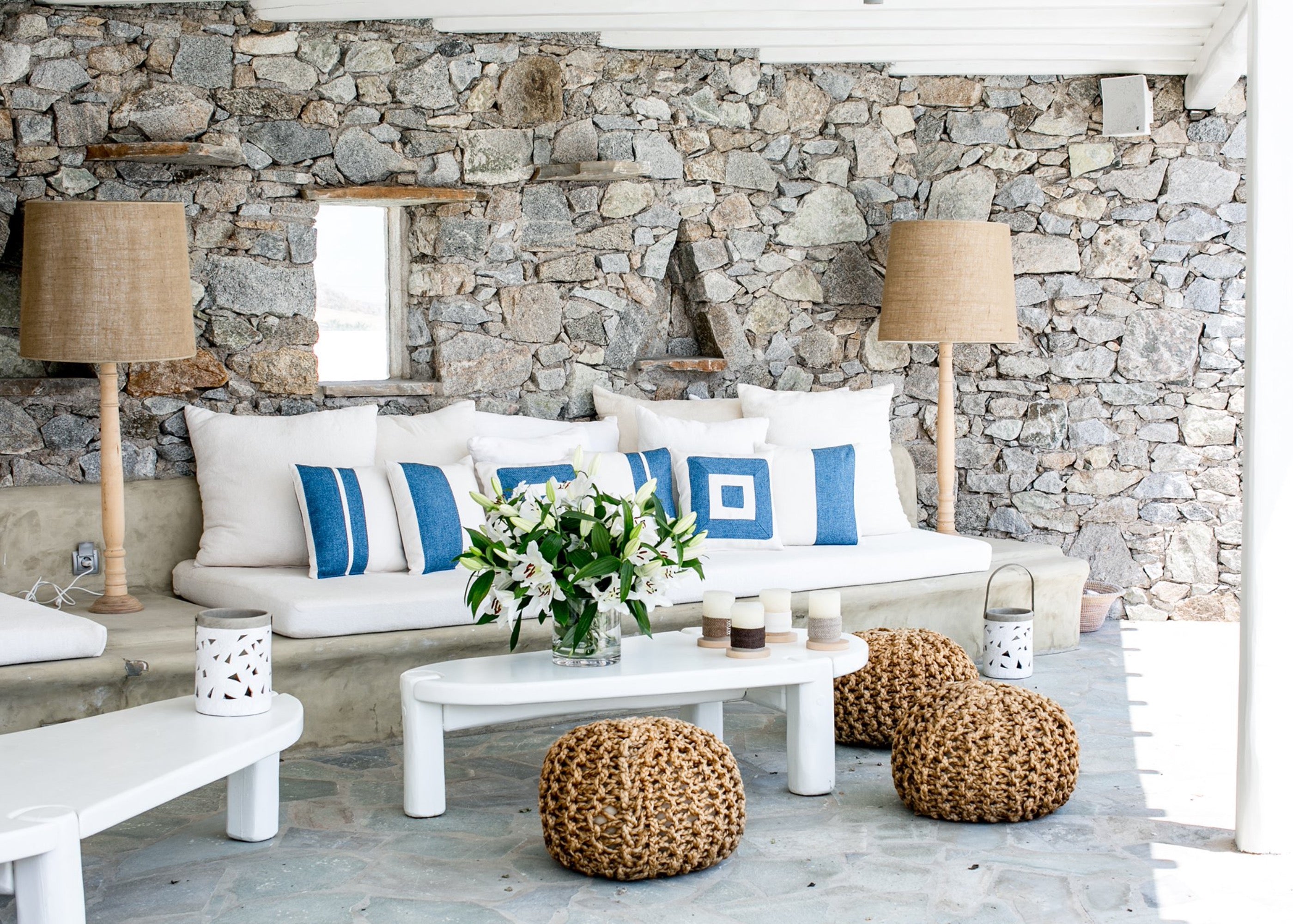 Themis Z handmade cushion adorned with a hand-stitched pattern.