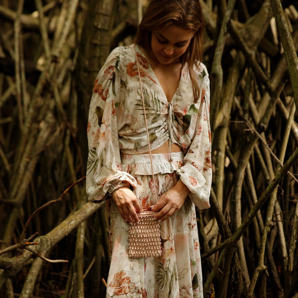 Lady holding pink purse