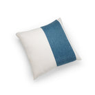 Themis Z handmade cushion adorned with a hand-stitched pattern.