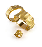 The Vendorafa Dune Pinnacle collection with two gold bracelets and a gold ring